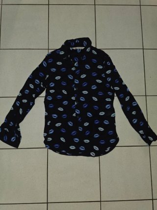 Conjunto blusa manga larga y mini falda