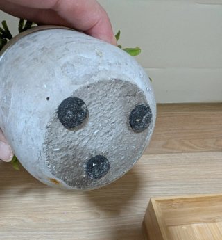 Maceta decorativa pequeña gris y verde
