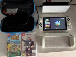 Nintendo switch oled blanca+2 juegos +funda+estuch