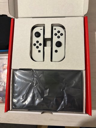 Nintendo switch oled blanca+2 juegos +funda+estuch