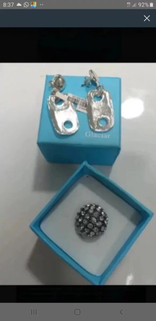 Pendientes y anillo plateados nuevos