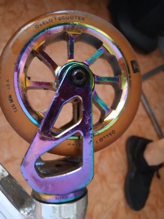 Patinete freestyle plateado