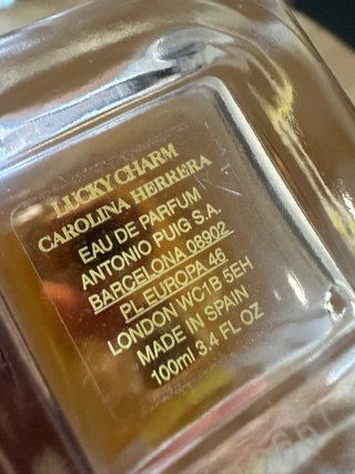 Perfume CH Lucky Charm Dorado y Amarillo