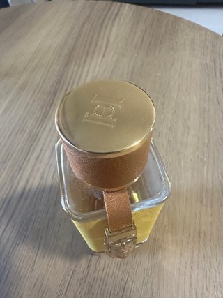 Perfume CH Lucky Charm Dorado y Amarillo