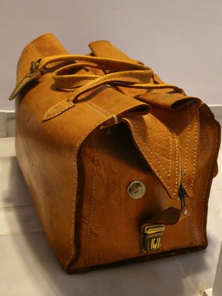 Bolso de viaje antiguo de cuero auténtico