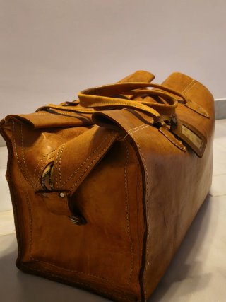 Bolso de viaje antiguo de cuero auténtico