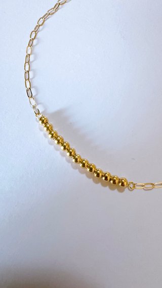 Bracciale con sfere lucide in oro giallo 18kt 750