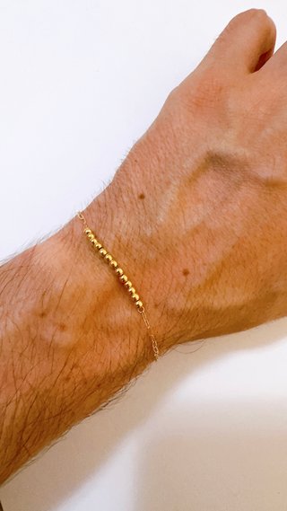 Bracciale con sfere lucide in oro giallo 18kt 750