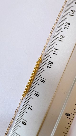 Bracciale con sfere lucide in oro giallo 18kt 750