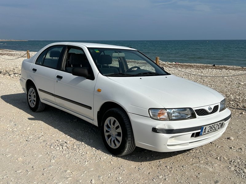 Nissan Almera 1999 Automatico - foto 1