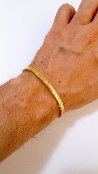 Bracciale a molla unisex in oro giallo 18kt 750