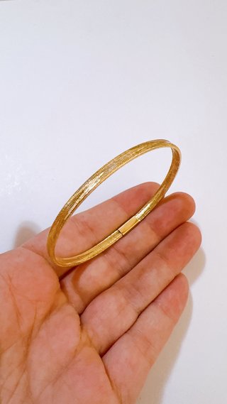 Bracciale a molla unisex in oro giallo 18kt 750
