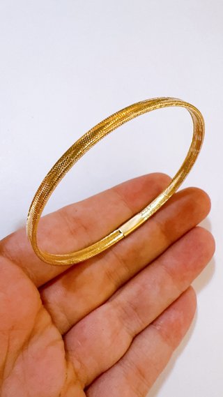 Bracciale a molla unisex in oro giallo 18kt 750