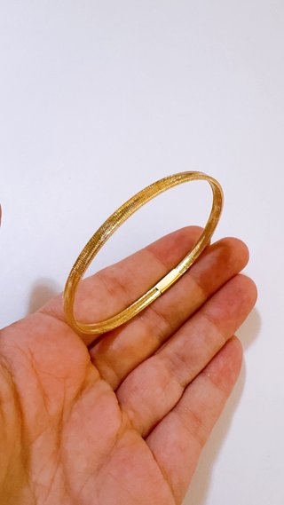 Bracciale a molla unisex in oro giallo 18kt 750