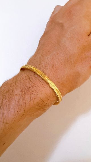 Bracciale a molla unisex in oro giallo 18kt 750