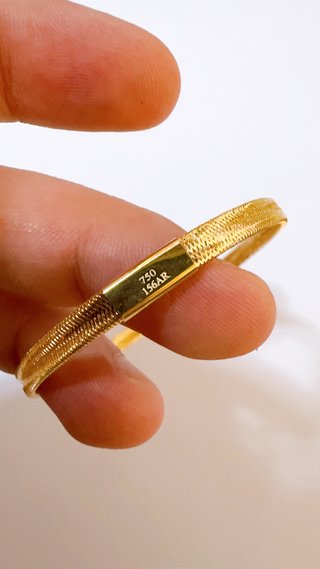 Bracciale a molla unisex in oro giallo 18kt 750