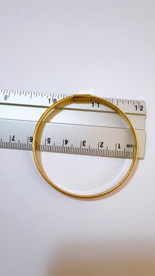 Bracciale a molla unisex in oro giallo 18kt 750