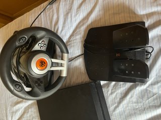 Play 4 + Volantes + Juegos