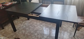 Mesa de comedor de madera oscura extensible