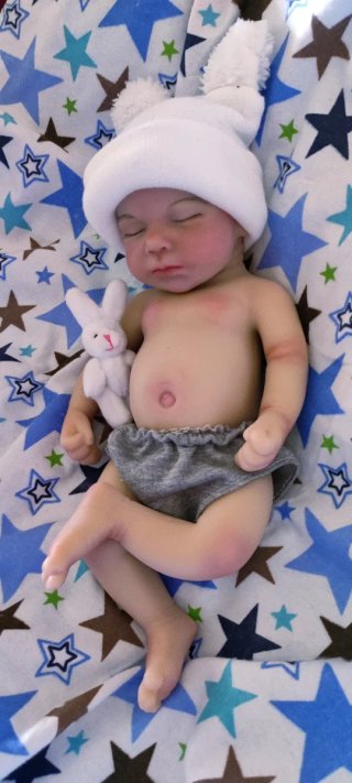 Niño silicona 33cm calvo