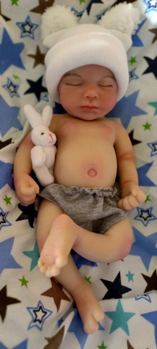 Niño silicona 33cm calvo