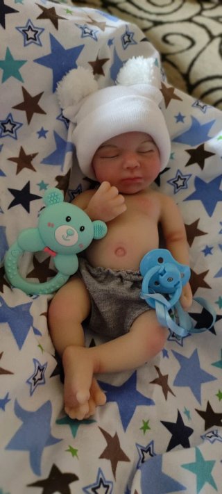 Niño silicona 33cm calvo