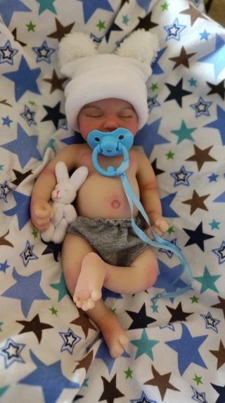 Niño silicona 33cm calvo