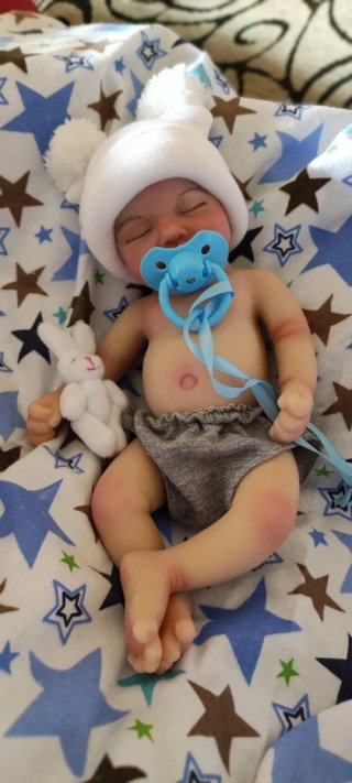 Niño silicona 33cm calvo