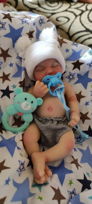 Niño silicona 33cm calvo