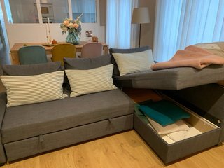 Sofá cama con chaiselongue, gris oscuro