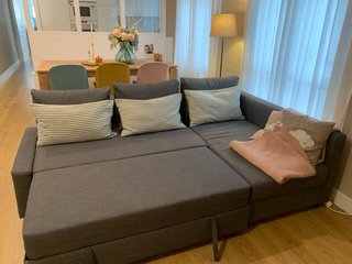 Sofá cama con chaiselongue, gris oscuro