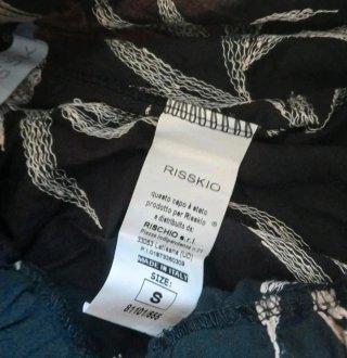 Pantaloni neri con fantasia floreale