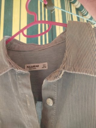 Camiseta sin mangas de tejido como vaquero.