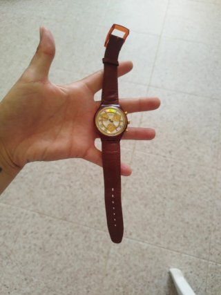 Reloj Swatch Chrono Marrón y Dorado