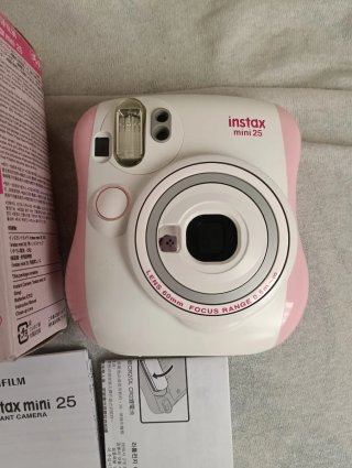 Cámara instax color rosa