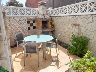 Mesa jardín Kettal redonda cristal y metal 6 pxs