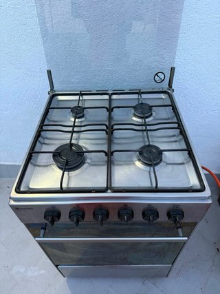 Cocina de gas Meireles de 4 fuegos con horno.
