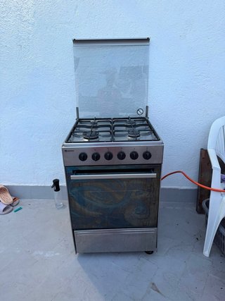 Cocina de gas Meireles de 4 fuegos con horno.