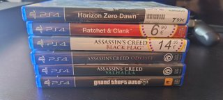 PS4 (PlayStation 4) Negra 1 TB y  JUEGOS