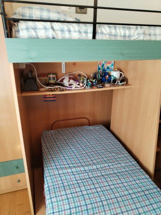 Habitación juvenil litera y cama plegable