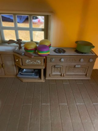 Casa Sylvanian con familia y luz