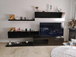 Mueble salón moderno negro y plata