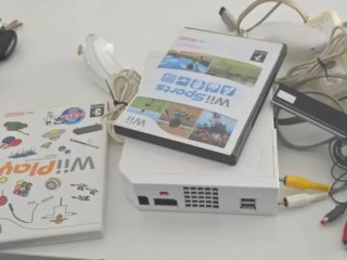 Nintendo Wii + Cables + 2 Juegos