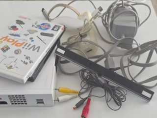 Nintendo Wii + Cables + 2 Juegos