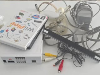 Nintendo Wii + Cables + 2 Juegos