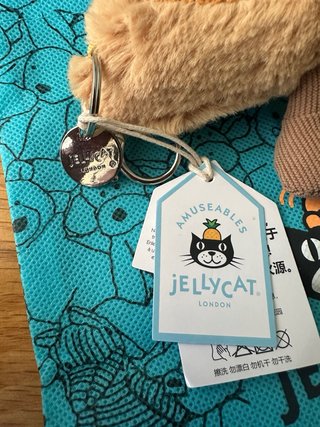 Jellycat Baguette Charm Azul y Marrón