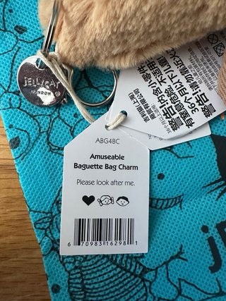 Jellycat Baguette Charm Azul y Marrón