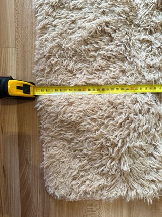 Alfombra beige y marrón de poliéster