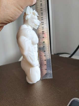 Figura de hombre perro