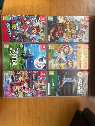 Nintendo Switch + 4 juegos + accesorios